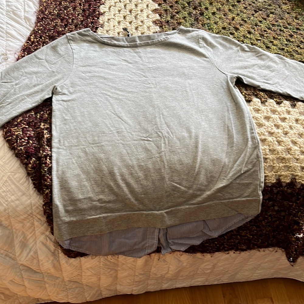 J Crew grey top with blue white striped on sleeve